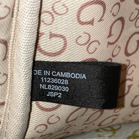 Guess Green Small Nylon Backpack:small discoloration inside by tag. Looks new. - Picture 11 of 13